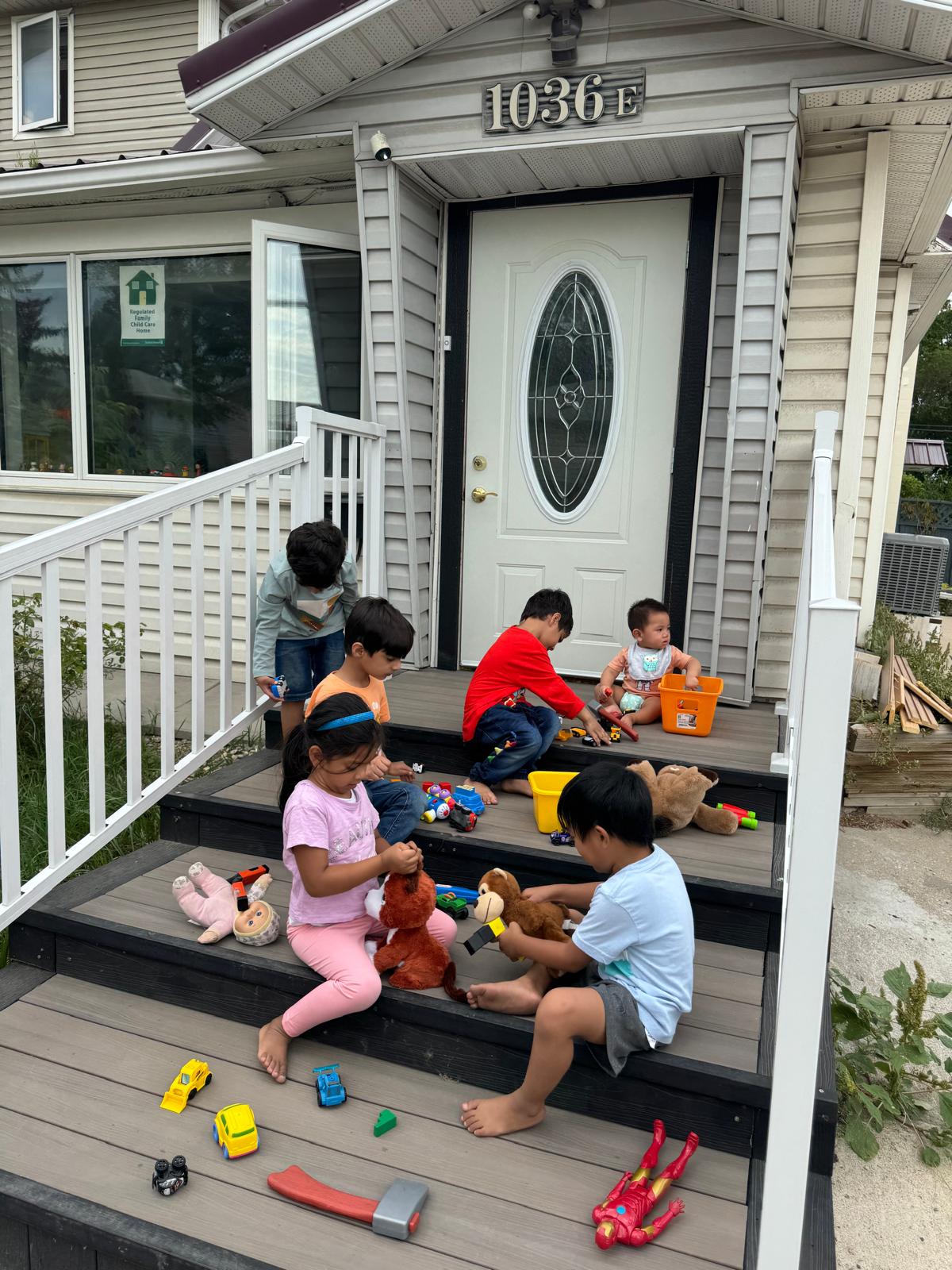 Children engaged in learning activities at Little Flower Daycare
