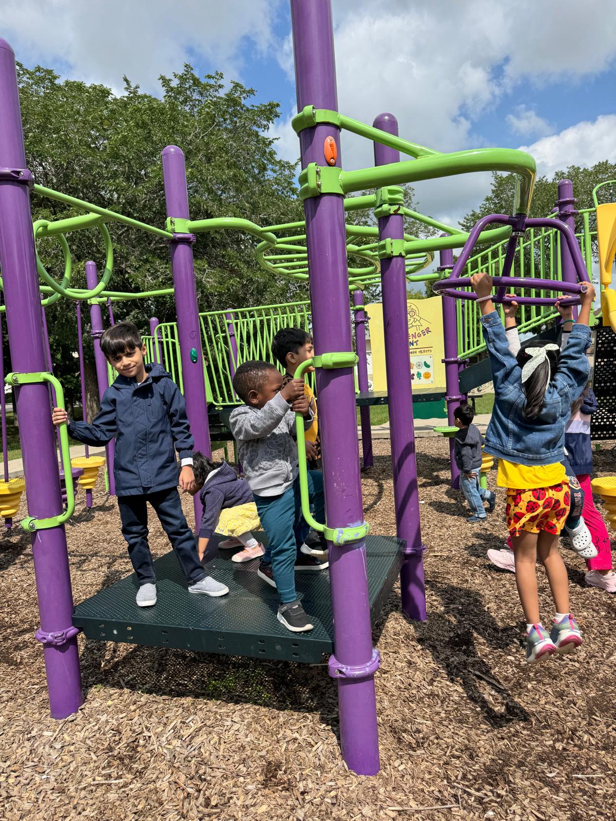 Children enjoying outdoor play at Little Flower Daycare Regina